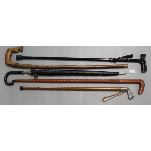 167 - Bundle of assorted walking sticks, golf club, umbrella etc.   (B.P. 21% + VAT)