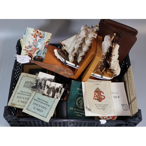 179 - Tray of oddments to include: ship bookends, odd postcards and ephemera, cash tin, cufflinks etc.   (... 