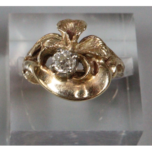 202 - Yellow metal floral design diamond solitaire ring. 6.1g approx.  Ring size J1/2.   0.2ct approx.  (B... 