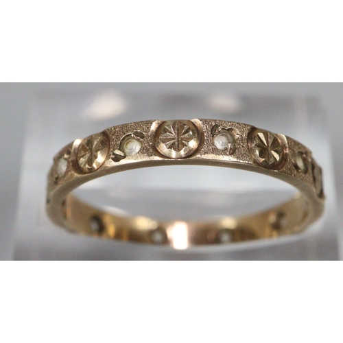 205 - 9ct gold engraved eternity style ring, another similar unmarked, a 9ct white gold solitaire ring.   ... 