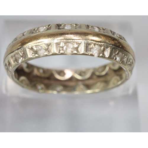 205 - 9ct gold engraved eternity style ring, another similar unmarked, a 9ct white gold solitaire ring.   ... 