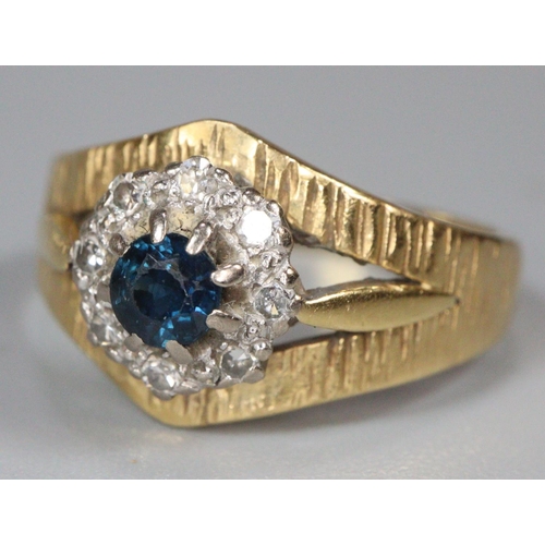 207 - 18ct gold bark finish diamond and sapphire ring. Size K1/2.   4.6g approx.  (B.P. 21% + VAT)