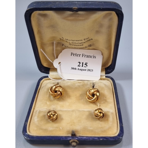 215 - Pair of knot design 14ct gold cuff links with matching studs, cased.  Marked '585'.  5g approx.  (B.... 