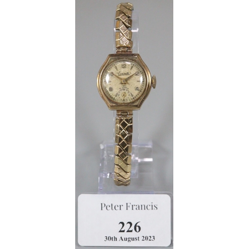 226 - 9ct gold 'Everite' ladies wristwatch with Arabic numerals and seconds dial, on plated expanding brac... 