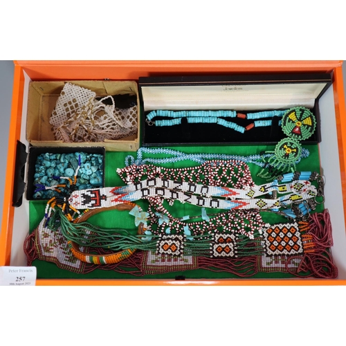 257 - Box of Canadian/American Native Indian jewellery including: necklace, various beaded bracelets etc. ... 