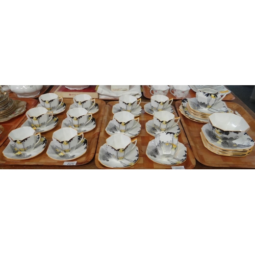 259 - Three trays of Shelley English bone china 'Sunrise and Tall Tree' design tea ware to include: twelve... 