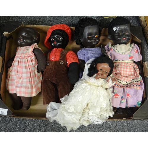 268 - Box of dolls with moveable limbs: doll in a wedding dress, black baby dolls with homemade clothes, t... 