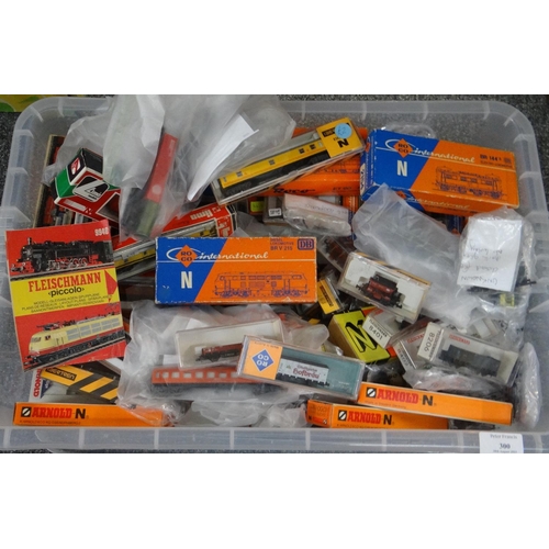 300 - Box of N gauge model railway items to include: various locomotives and carriages; Roco, Ibertren, Ar... 