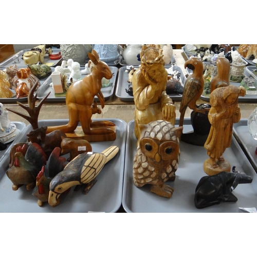 332 - Two trays of carved wooden figures, to include: various birds, cockerel, parrot, owl, camel, kangaro... 