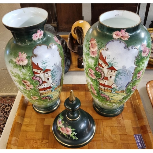 376 - Two similar opaline glass baluster shaped vases decorated with reserve panels of country houses amon... 