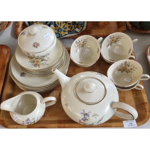 378 - Bavarian China tea set by Hutchenreuther, transfer printed with floral decoration on a cream ground.... 