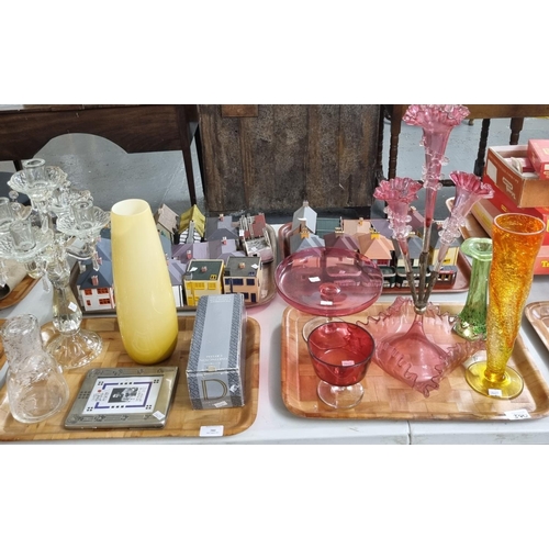 380 - Four trays of assorted glassware to include: candelabrum, ovoid vase, cranberry glass epergne and ot... 