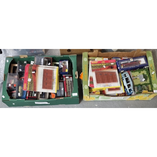 397 - Two trays of assorted diecast model vehicles in original boxes, mainly buses, together with various ... 