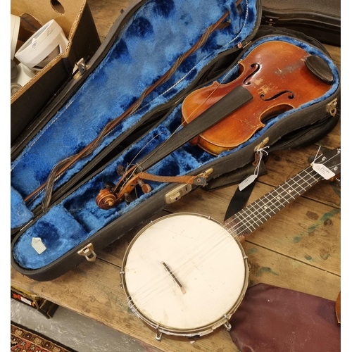 401 - Student violin with bow in fitted case together with a ukulele having fabric case.  (2)    (B.P. 21%... 