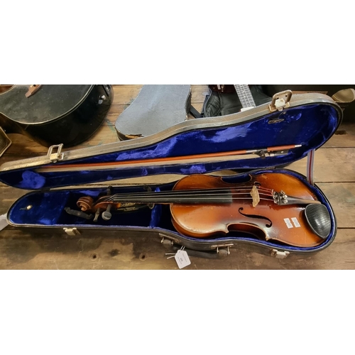 408 - Stradivarius copy student violin in fitted case with bow.   (B.P. 21% + VAT)