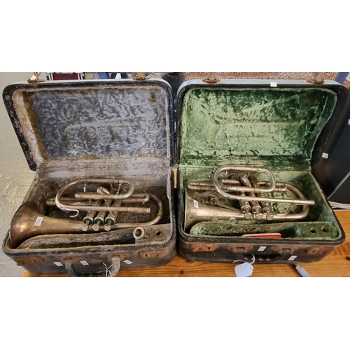 412 - Two similar cornets in fitted cases, by Besson.  (2)   (B.P. 21% + VAT)