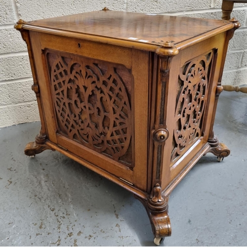 435 - Victorian walnut cabinet with fretwork panel on scrolled feet. Possibly the base of a What-not.  (B.... 