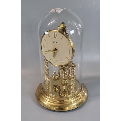 84 - Kern German made brass perpetual motion dome clock, with glass dome.  Overall 31.5cm high approx.  (... 