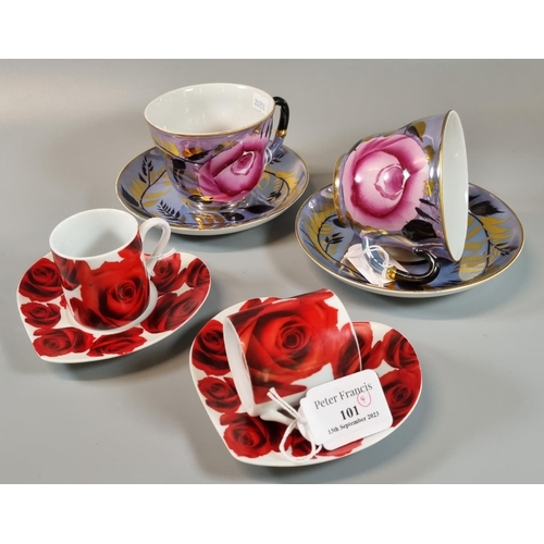 101 - Pair of Finecasa porcelain rose design coffee cans and saucers together with a pair of USSR rose des... 