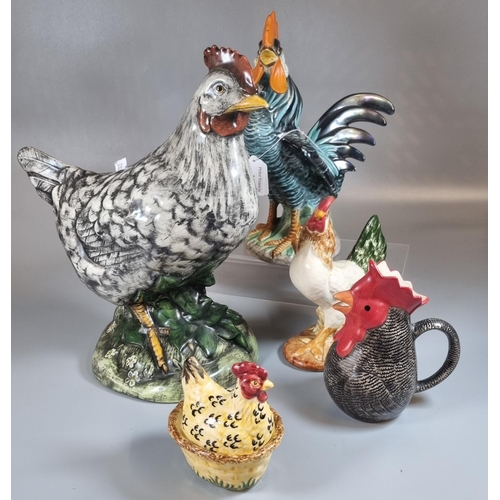 149 - Collection of ceramic chickens and roosters, to include: jug and small egg crock.  (5)  (B.P. 21% + ... 