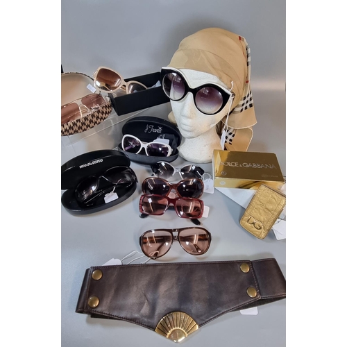 202 - Box of designer style fashion accessories and electricals to include: various sunglasses and sunglas... 