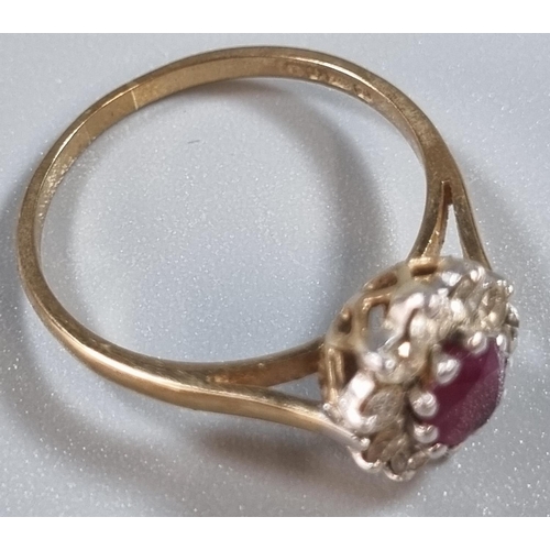 206 - 9ct gold diamond cluster and ruby ring.  2.2g approx. Size N.  (B.P. 21% + VAT)