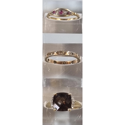 214 - 9ct gold brown and clear stone dress ring (3.4g approx) together with yellow metal five stone dress ... 