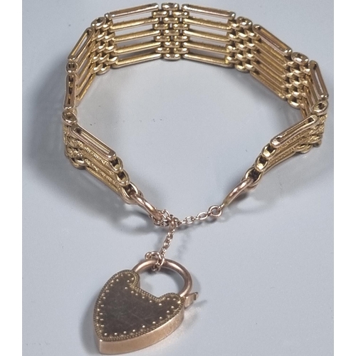 228 - 9ct gold gate bracelet with heart padlock.  24g approx.  (B.P. 21% + VAT)