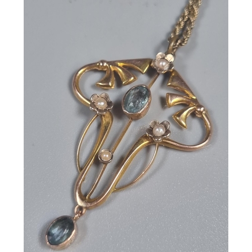 229 - 9ct gold Art Nouveau seed pearl and blue stone pendant on chain.  (B.P. 21% + VAT)