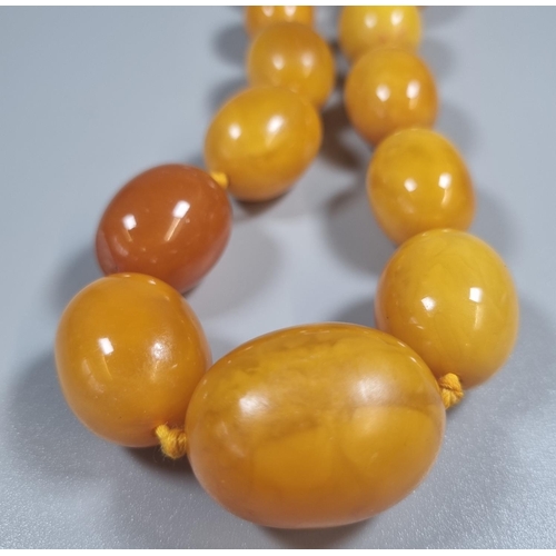 230 - Butterscotch coloured beaded necklace.  (B.P. 21% + VAT)