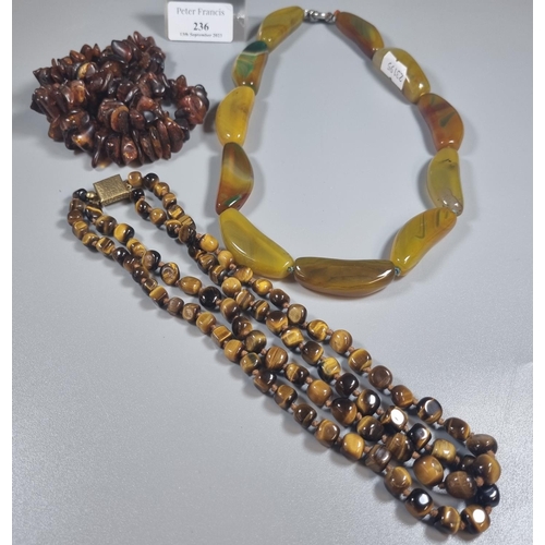 236 - Three hardstone necklaces to include tiger's eye and others.  (B.P. 21% + VAT)