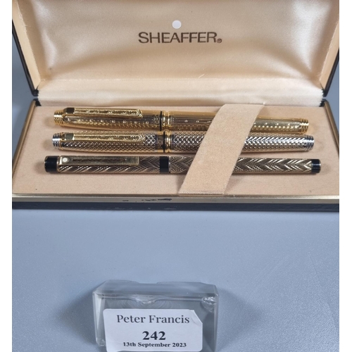 242 - Sheaffer USA 14K nib fountain pen together with two other fountain pens, one marked Ridium Point Ger... 