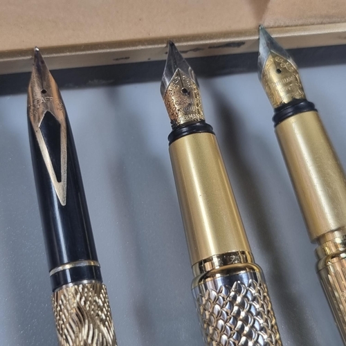 242 - Sheaffer USA 14K nib fountain pen together with two other fountain pens, one marked Ridium Point Ger... 