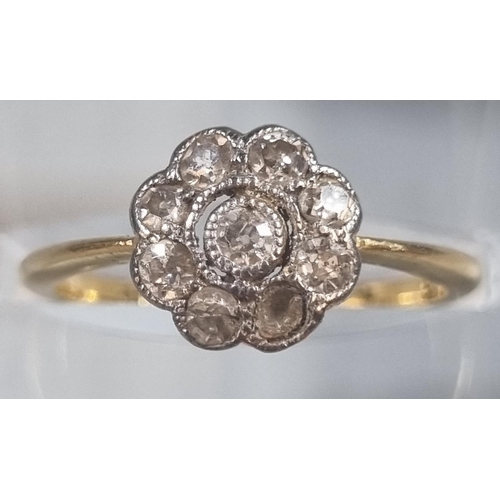 248 - 18ct gold and diamond flowerhead ring, missing one diamond.  2.3g approx.  Size K.  (B.P. 21% + VAT)