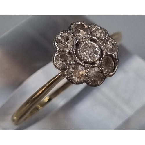 248 - 18ct gold and diamond flowerhead ring, missing one diamond.  2.3g approx.  Size K.  (B.P. 21% + VAT)