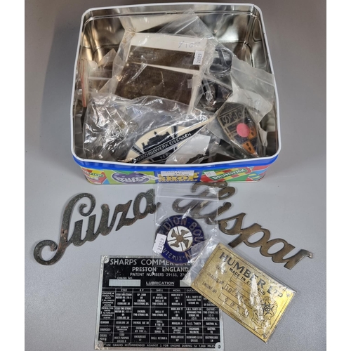 267 - Interesting box of assorted vintage car badges and chassis plates to include: Aston Martin Chassis N... 