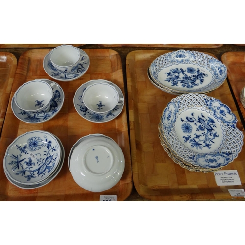 273 - Four trays of blue and white Meissen porcelain 'Blue Onion' design items to include: teacups and sau... 