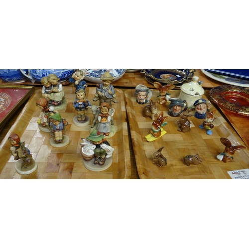 279 - Two trays of china to include: various Hummel West German figures of children, some with animals, ce... 