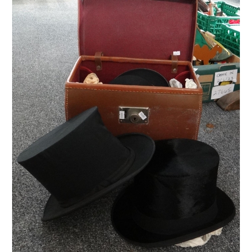 300 - Leather travelling case containing three late 19th/early 20th Century hats to include: a Christys' L... 