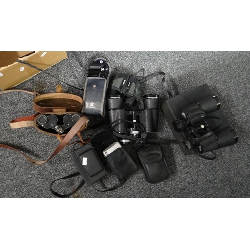 312 - Box of cameras in cases and binoculars to include: Youngs Leicester Astral 10x50 field binoculars, p... 