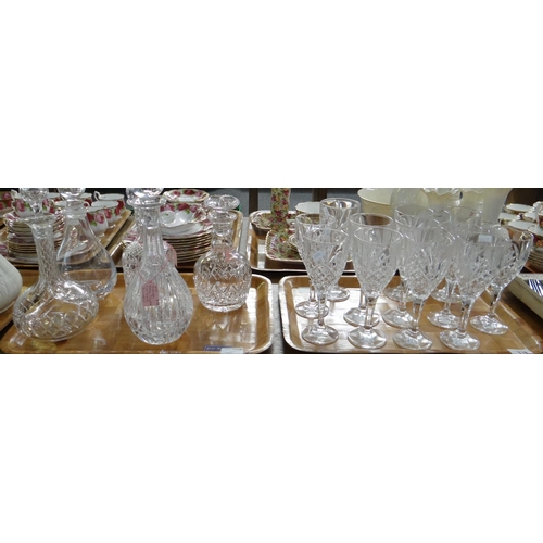 319 - Two trays of glassware to include: wine glasses, cut glass decanters with star cut bases and stopper... 