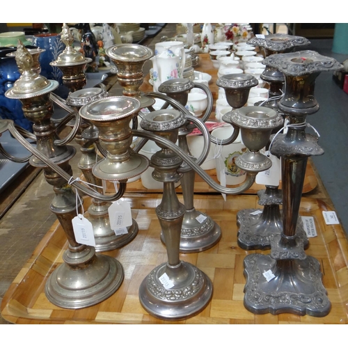 342 - Tray of silver plated candlesticks and candelabrum. 
(B.P. 21% + VAT)