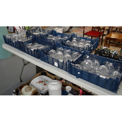 359 - Seven crates of glassware to include: various drinking glasses, liqueur glasses, wine glasses, champ... 