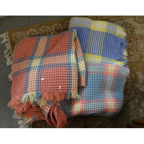 369 - Box containing three vintage woollen fringed honeycomb check blankets in various colourways. 
(B.P. ... 