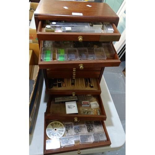 374A - Wooden table top multi-drawer watch makers/collectors cabinet containing various watch and jewellery... 