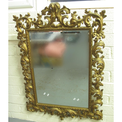 381 - 18th century style bevelled Florentine design gilded mirror.  116x78cm approx.  (B.P. 21% + VAT)