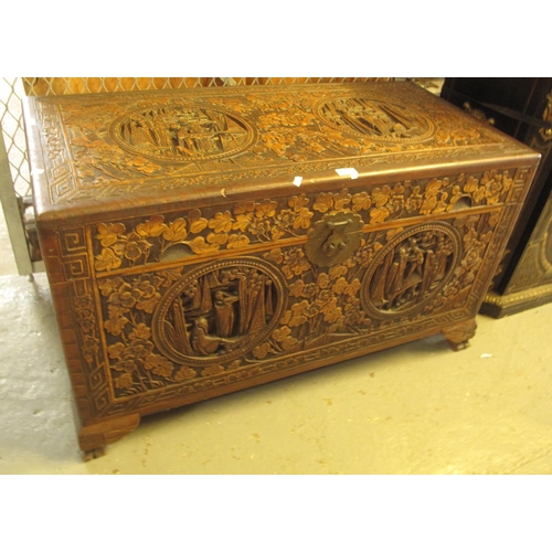 386 - Chinese hardwood intricately carved camphor wood chest with circular panels depicting figures within... 