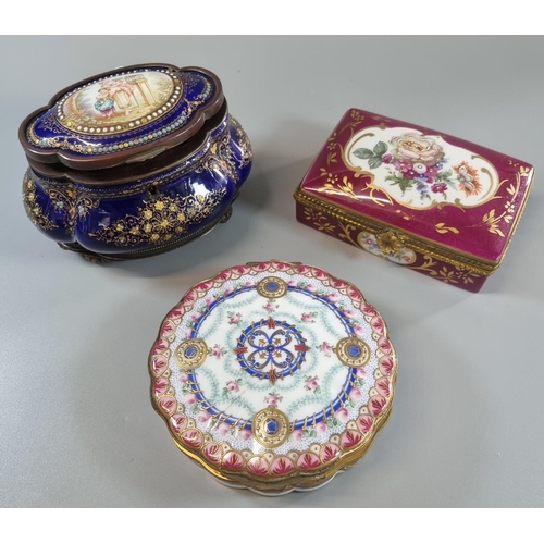 4 - Collection of three continental porcelain boxes including one cobalt blue ground casket, all with fi... 
