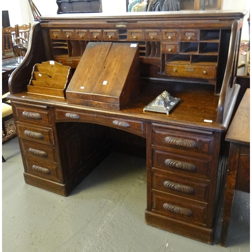 449 - Early 20th century oak 'S' roll top desk having a bank of four drawers to each pedestal.  (B.P. 21% ... 