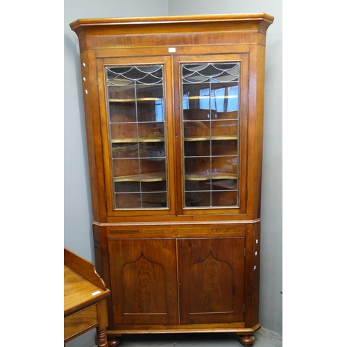 455 - Victorian mahogany double corner cupboard with chequered banding under a moulded cornice, later lead... 